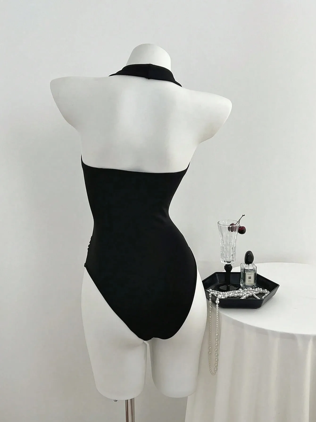 Women Halter Deep V Front Twist Knot Ruched Waist Bodysuit Solid Black Sleeveless Slim Fit Y2K Basic Jumpsuit Top — image 3